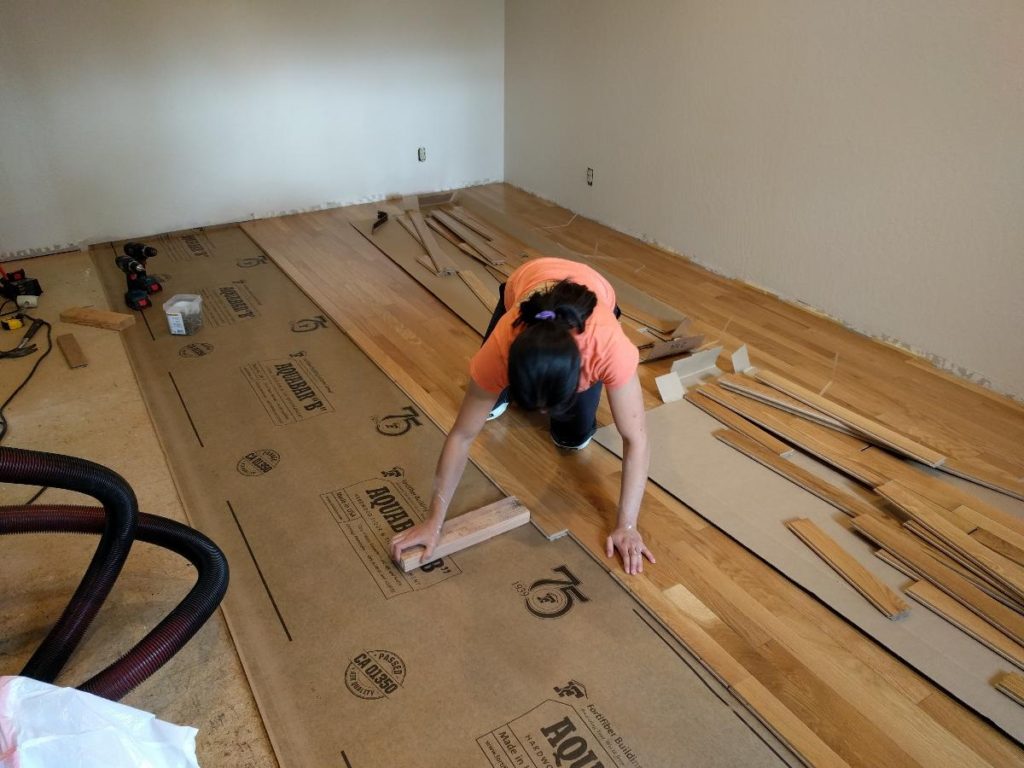 installing hardwood floor hammering rows together
