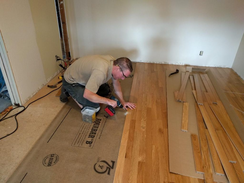 installing hardwood floor drilling