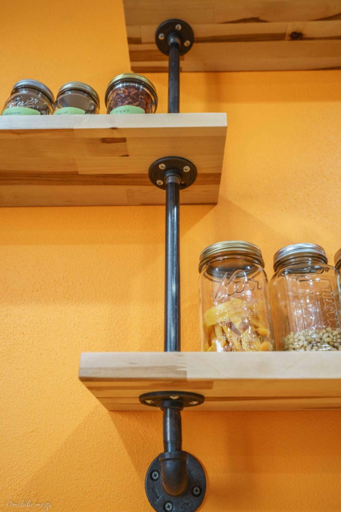 floating kitchen shelves with pipe