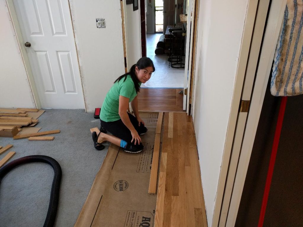 installing hardwood floor laying rows