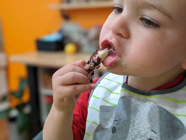 child eating octopus
