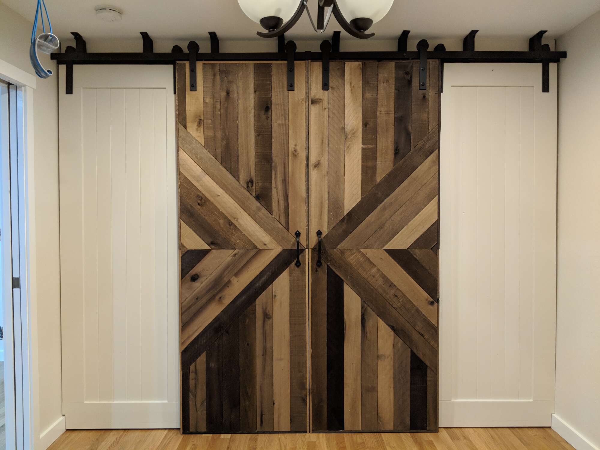 sliding barn door: a step-by-step guide on how to build a diamond-pattern d...