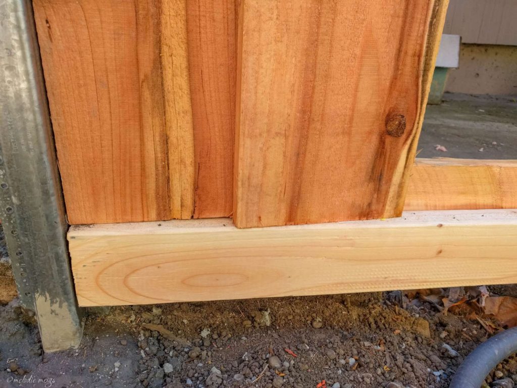 installing modern good neighbor fence bottom