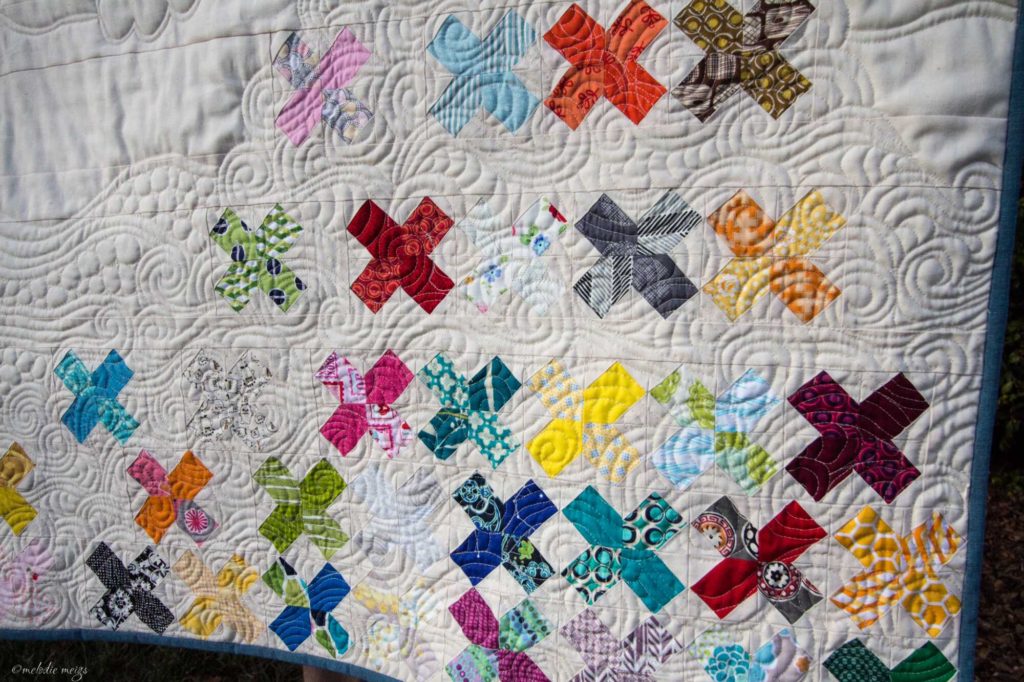 wholecloth quilt wave patchwork close-up